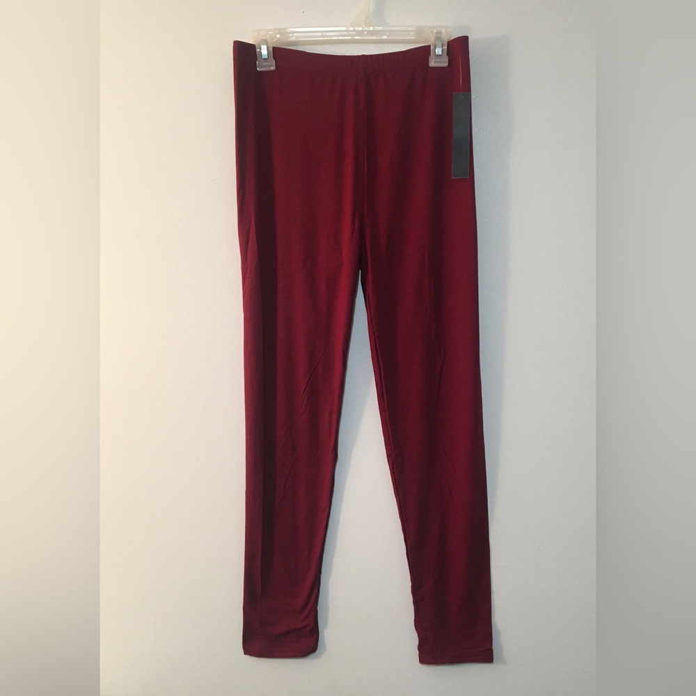 Item # L25. NWT. Plus size burgundy leggings